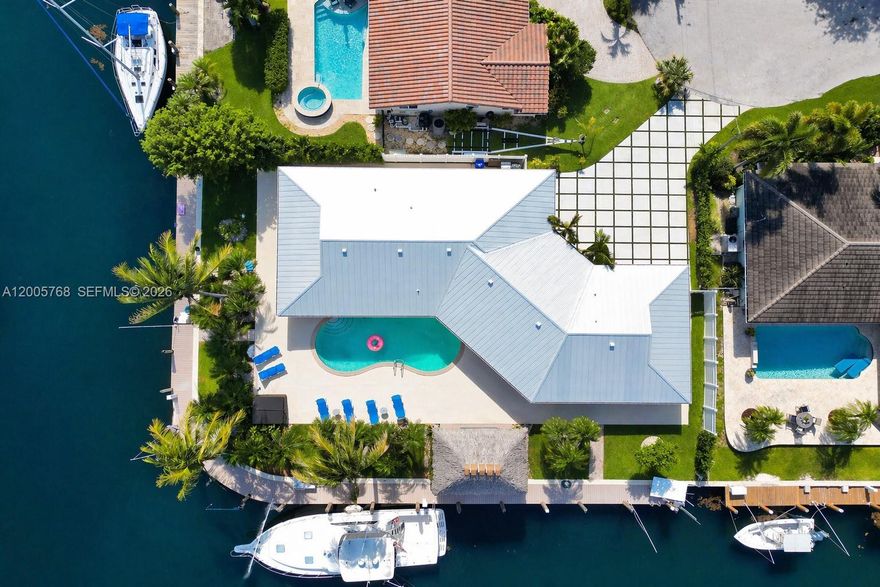 CONTACT FOR PICS! Fully Renovated Waterfront Home With 200+ Ft Of Deep Water Frontage In Harbor Village. Rare Corner Lot Offering Approx. 100 Ft On Each Side With Wide Canal & Turning Basin, Ideal For Multiple Vessels & Rental Income Potential With Dockage, Power, Water & Boat Whips + a Lift! Fully Renovated Waterfront Home With 200+ Ft Of Deep Water Frontage In Harbor Village. 
All Major Upgrades Completed Within The Last 2 Years Including New Metal Roof (2024) With 50-Year Warranty, Impact Windows & Doors, Modern Garage Doors (2025), New PVC Plumbing, Full Home Generator, Renovated Driveway & Updated Exterior Paint (2026) & Lighting. Newly Resurfaced Pool (2026) With Diamond Brite Finish, New Pool Heater (2026) & Deck Sealed With V-Shield Protective Coating (2026). Elevated Tiki Hut With TV, Speakers, And Fishing Setup Creates The Ultimate Waterfront Experience..Imagine This Lifestyle! Interior Features a Bright Open Layout With Floor To Ceiling Windows, Split Bedroom Plan, Expanded & Renovated Bathrooms (2025) & Seamless Indoor/Outdoor Living. Laundry is Inside & Can Be Converted Outside For a Larger Pantry. No HOA!! Minutes To The Inlet, Beaches, Dining & Fort Lauderdale-Hollywood International Airport. True Boater’s Property With Floating Dock, Lift, Power/Water & Effortless Ocean Access. Designed For Entertaining, Fishing & Maximizing The South Florida Waterfront Lifestyle.