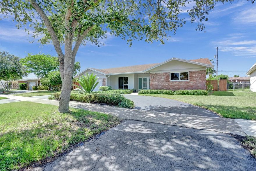 Welcome to this stunning 4-bed/den home located in highly sought after Imperial Point neighborhood! 2700 SF of living space and over 3,000 total SF, this bright, open-concept floor plan is perfect for modern living and entertaining. W/panoramic views of the freshly diamond bright pool from nearly every room. Luxury vinyl flooring, upgraded kitchen w/elegant quartz counters, s/s appls, and ample cabinetry. Both baths tastefully updated, newer washer/dryer, water heater, Impact windows/doors, 2-car garage w/impact garage door, epoxy flooring, 2 A/C's. Minutes from the beach, shopping, dining, entertainment, walking distance to Pine Crest Private School, with several other highly rated schools nearby. SELLER TO SPONSOR 2/1 Temporary Interest Rate Buydown for qualified buyers and offer.