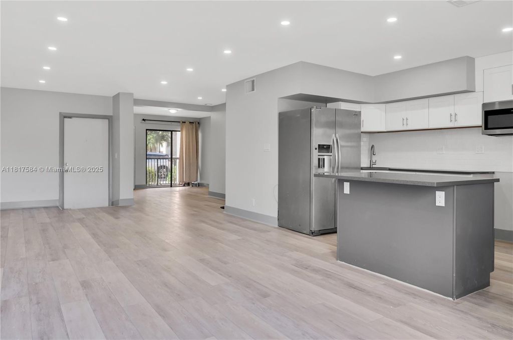 Photo of 9123 NW 38th Dr #33, Coral Springs, FL 33065 (MLS # A11817584)