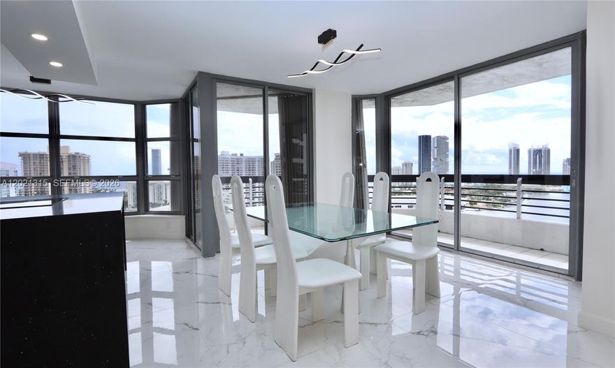 Spectacular renovated 2BR/2BA corner unit with unobstructed panoramic SE views and ocean and intracoastal views from every room! Immaculate kitchen with waterfall countertop. Split floor plan offers privacy, with a spacious primary suite, ensuite bath, and custom walk-in closets. No detail spared—this elegant, functional home is a rare gem. Enjoy resort-style living in the coveted Mystic Pointe community with marina, fitness center, heated pool, library, 7 clay tennis courts, 4 pickleball courts, basketball court, dog park, mini market, a beauty salon, e-car charging stations, and on-site restaurant and  a convenience shop.
