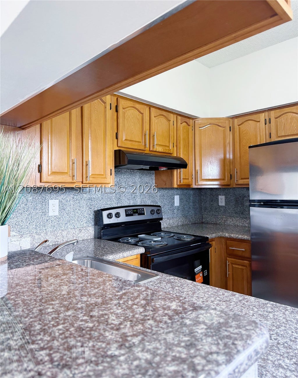 Photo of 2001 NW 96th Ter #10J, Pembroke Pines, FL 33024 (MLS # A12087695)