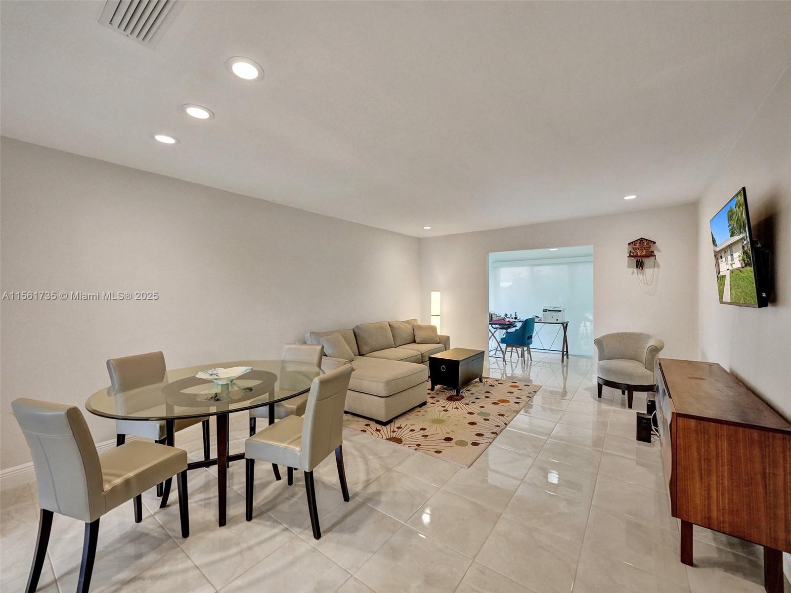 Step into this charming 2-bed, 2-bath corner lot villa, fully remodeled in 2019 with new tile throughout. The kitchen boasts custom cabinetry, quartz countertops, and high-end appliances, featuring an induction stove top by GE Profile, a sleek Bosch dishwasher, an LG refrigerator, and a Miele kitchen exhaust system. Impact windows throughout.
Bathrooms feature glass showers and custom vanities. Beyond its impeccable interior, this condo resides within a picturesque community, offering residents an array of amenities and scenic outdoor spaces, like the clubhouse with social space for events, two pools, bocce ball, shuffleboard, tennis, pickleball courts, and a serene pond with a fountain, all accented by the signature Covered Bridge. Experience luxury living in this delightful condo.