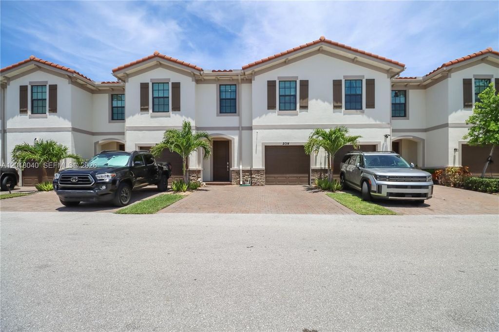 Photo of 2014 Sugar Maple Dr #2014, Riviera Beach, FL 33410 (MLS # A12018040)