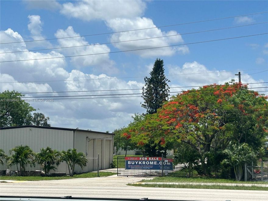 MUST SEE! Rare and amazing investment opportunity to own a piece of the action on Krome! This PREMIUM PARCEL is located just minutes from Kendall in the center of all the hustle and bustle, business and development growth, and is poised to provide any new owner with the opportunity to be successful at nearly any venture! Rumor is that commercial zoning for this area is in the future City Plan and is sure to increase the value of this property even more! Luxury subdivisions are in the works just blocks away, and this little gold mine awaits the savy investor, homeowner, or entrepreneur. The clean and open property has two entrances spaced out on 300' of Krome frontage, opens up to spacious flat land adorned with many fruit trees, and a newly updated home privately situated at the rear!