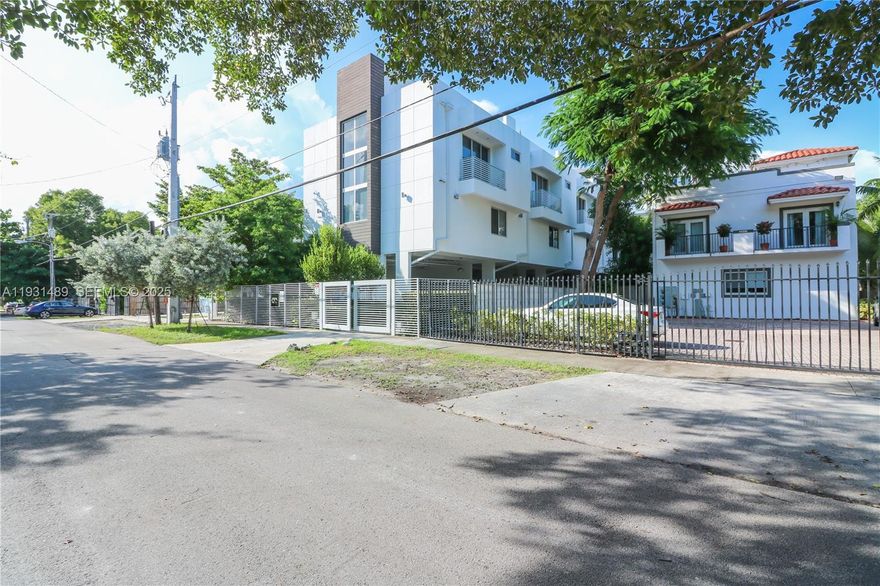 This gorgeous 2-bedroom, 1-1/2-bath townhome features a large rooftop terrace that provides stunning views of the lush Coconut Grove. The tri-level townhouse includes a convenient in-unit washer and dryer. It includes private parking and an electric gate for added security. Situated in the heart of Coconut Grove, you can enjoy a relaxing walk to the nearby bars and restaurants. Additionally, it's just a short drive from I95, Downtown Miami, or Miami Beach. NO HOA. Management Miami professionally manages the property. THE OWNER IS OPEN TO REVIEWING OFFERS!