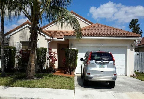 Photo of 16543 NW 5th Ct, Pembroke Pines, FL 33028 (MLS # A12025364)