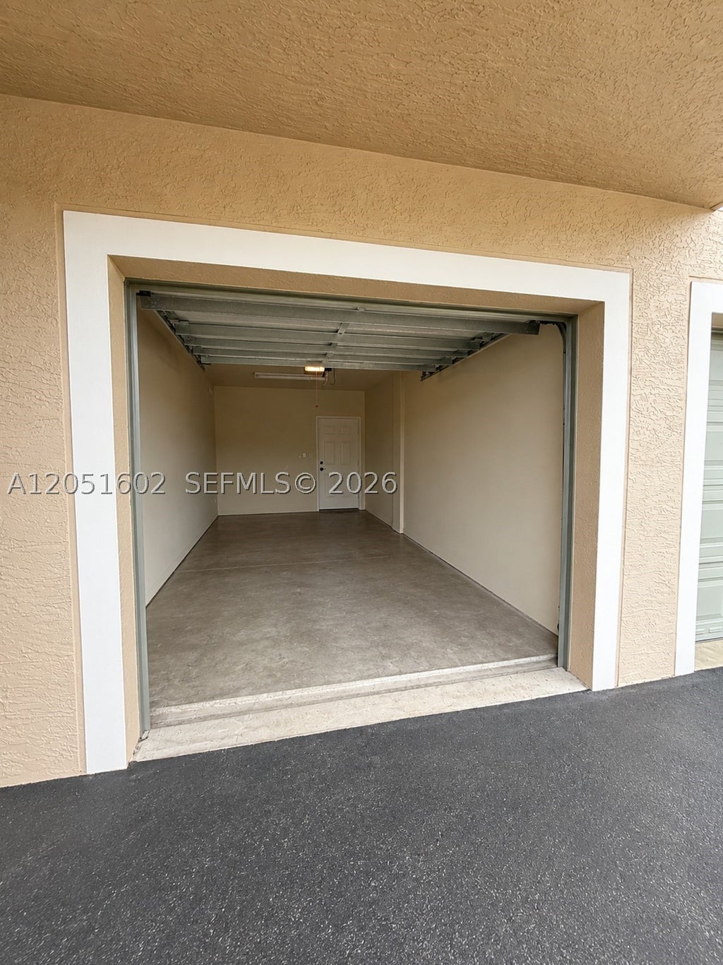 Photo of 6466 Emerald Dunes Dr #206, West Palm Beach, FL 33411 (MLS # A12051602)