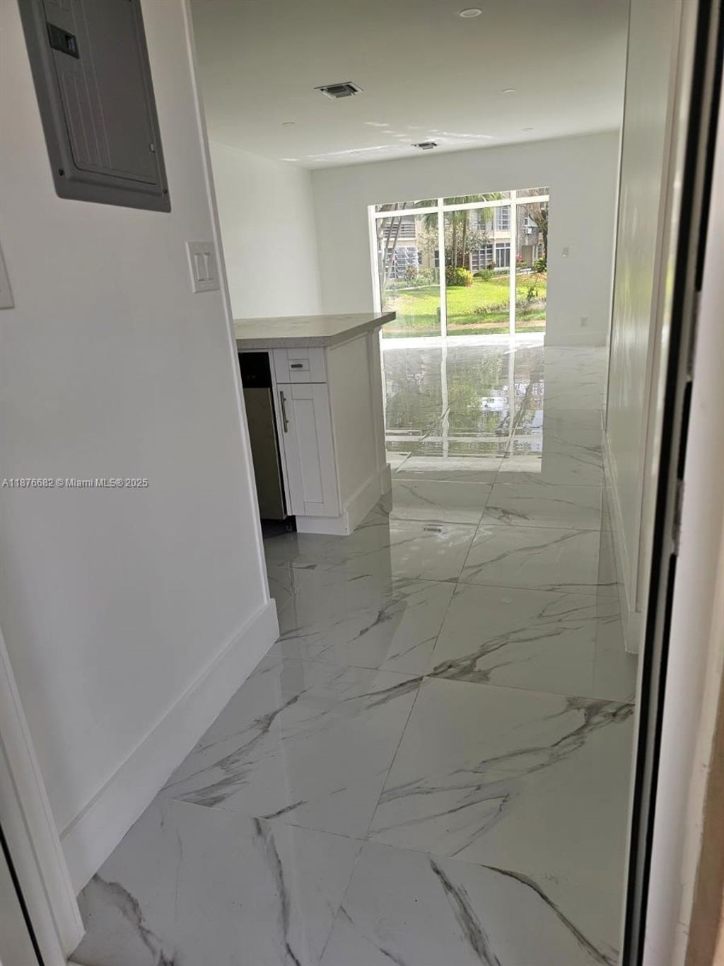 Photo of 3430 NW 52nd Ave #104, Lauderdale Lakes, FL 33319 (MLS # A11876682)