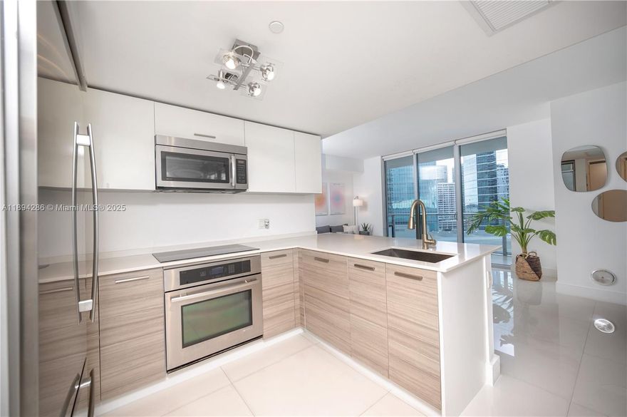 Fully furnished 1-bedroom, 1.5-bath residence in the prestigious BrickellHouse. Prime location with a soaring triple-height lobby and 24-hour welcoming front desk. Enjoy resort-style amenities including a 50-foot lap pool with private cabanas and a large heated spa. Residents have access to an elegant lounge with conference and meeting rooms, a children’s playroom with direct access to the resort deck, and a luxury spa featuring sauna, steam room, and private treatment suites. Stay active in the fully equipped fitness center, or unwind at the exclusive rooftop pool on the 46th floor—reserved for members and residents—offering a sun deck and breathtaking views of Biscayne Bay and the city skyline. Water and internet are included in the rent price.