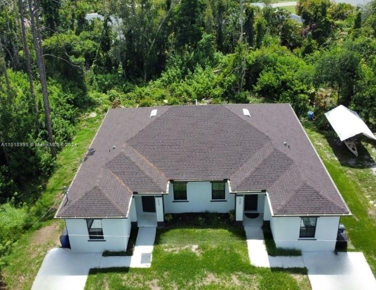 Excellent location. 6 Bedrooms 4 Bathrooms, Impact windows and doors. Tile all throughout.