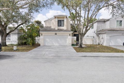 Photo of 2836 W River Run Cir W, Miramar, FL 33025 (MLS # A11981391)