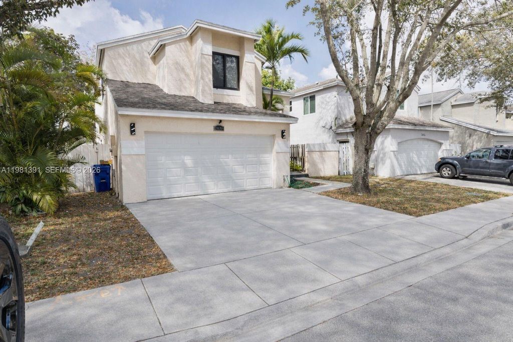 Photo of 2836 W River Run Cir W, Miramar, FL 33025 (MLS # A11981391)
