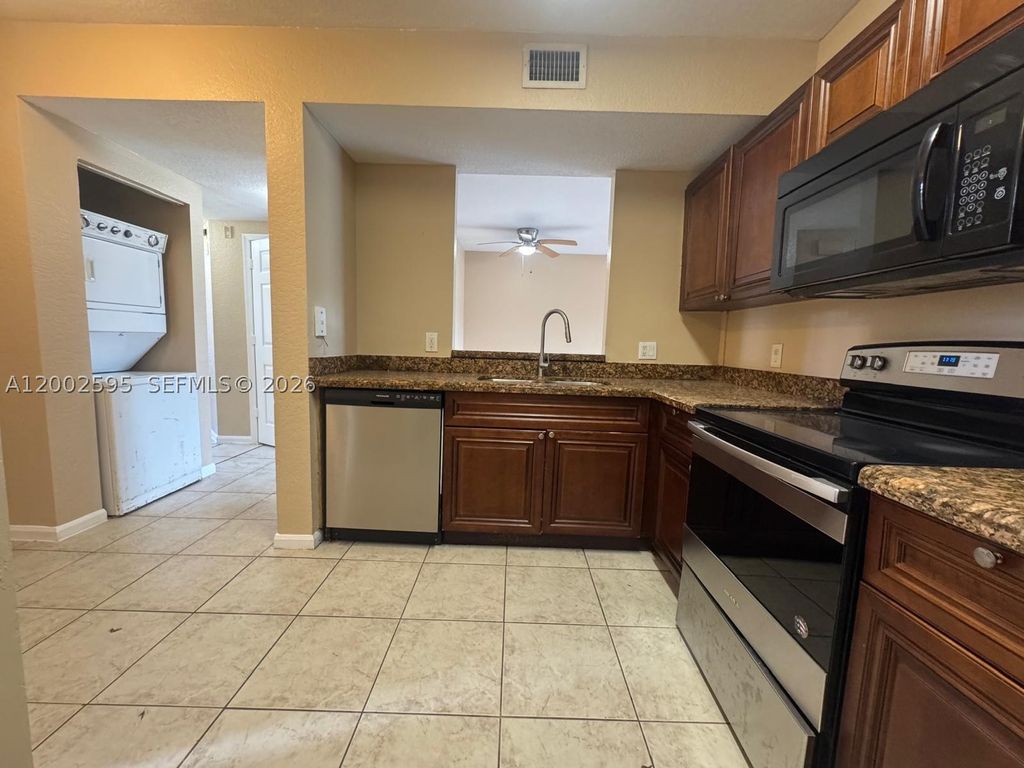 Photo of 1133 Golden Lakes Blvd #813, West Palm Beach, FL 33411 (MLS # A12002595)