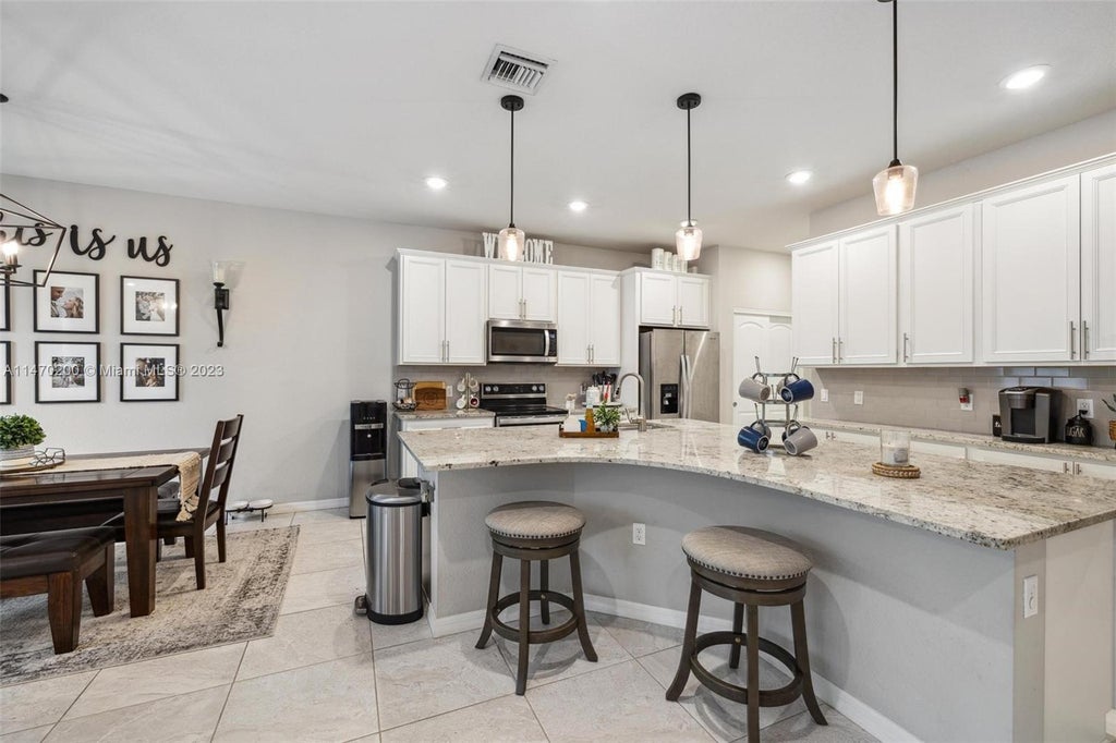 Photo of 4600 San Fratello Cir #0, Lake Worth, FL 33467 (MLS # A11470200)