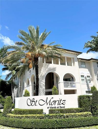 Discover this spacious and modern 3-bedroom, 2-bathroom apartment located on the ground floor of the desirable St. Moritz Residences in Doral FL. The unit comes with two parking spaces for your convenience. Open concept living area with natural light, kitchen with stainless steel appliances, a full size washer and dryer, ceramic flooring . Residents enjoy exclusive access to the community’s swimming pool and the Island at Doral’s main clubhouse. Close to top-rated schools, shopping, and dining.