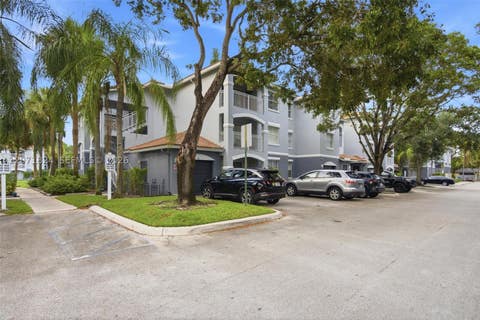 Photo of 9615 NW 1st Ct #302, Pembroke Pines, FL 33024 (MLS # A12071824)