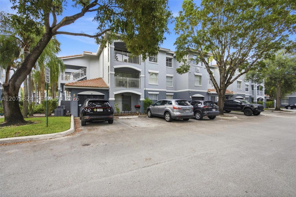 Photo of 9615 NW 1st Ct #302, Pembroke Pines, FL 33024 (MLS # A12071824)