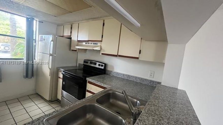 Beautiful unit, open lakefront balcony, no rental restriction, gated community, convenient location to I95 or Florida Turnpike, washer & Dryer in unit , laminate flooring, very quite and safe community. Ideal for living or for investment. Excellent price!!! The owner is motivated to make a cash deal.