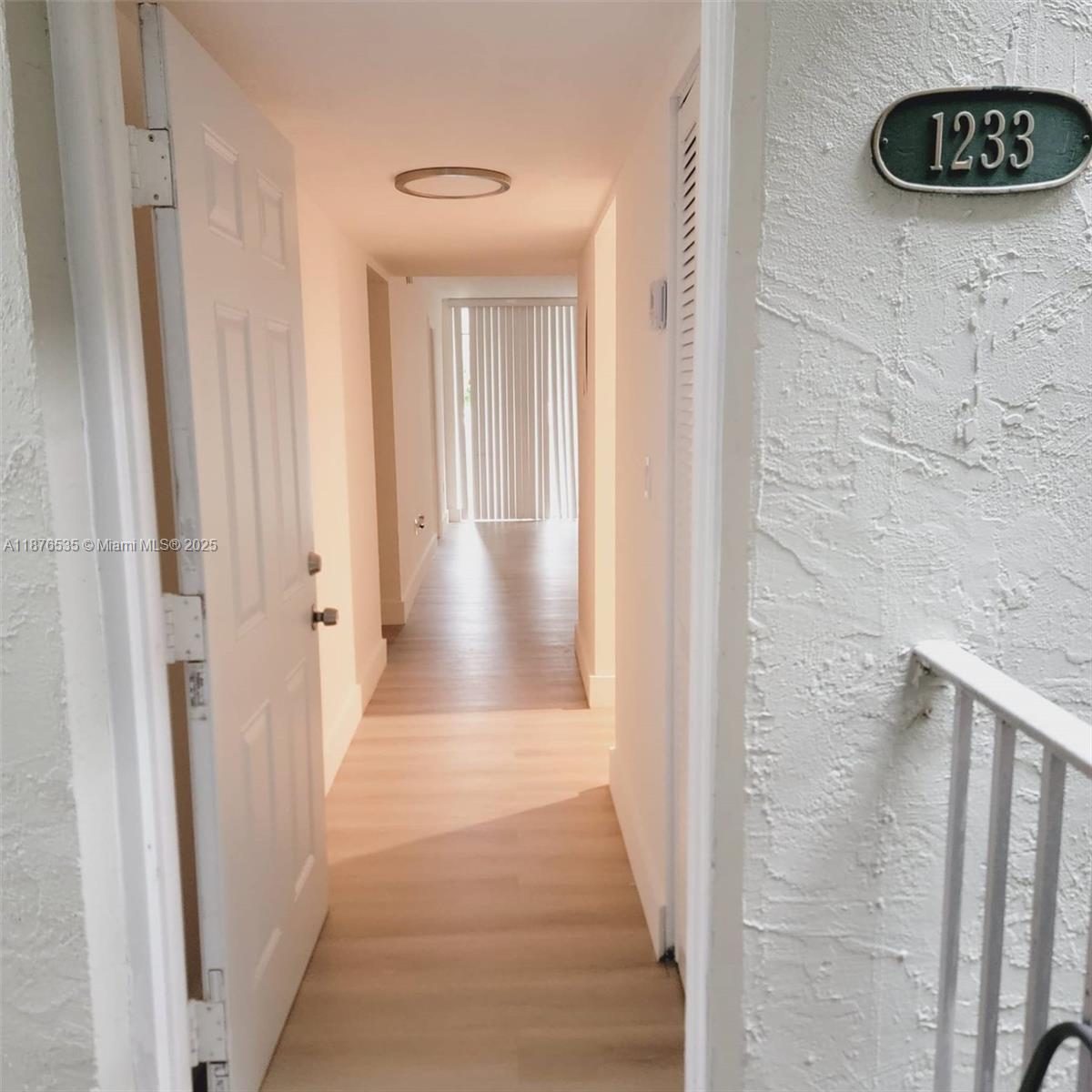 Renovated 2/2 condo with balcony! Feel secure with guarded security & fenced complex. The unit includes hurricane proof windows, washer and dryer, walk-in closets, great views and more! Community Amenities include trash chute, picnic areas, a club house, lake view & a water fountain. Near shopping, restaurants. This won't last long.