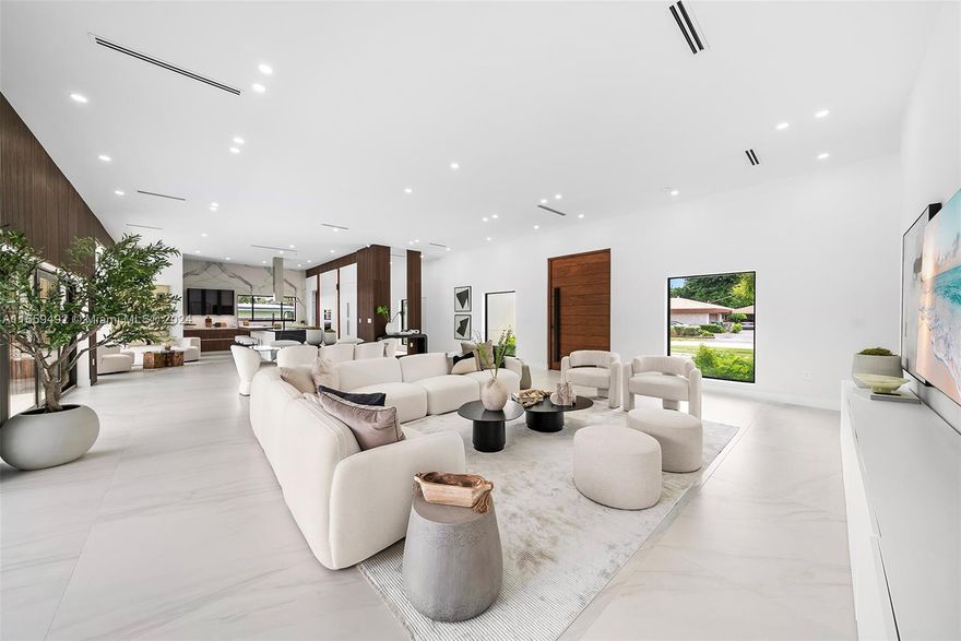 Ultra-modern, fully renovated home offers 5 bed and 5 bath, 3,300 SF liveable with 12ft high ceilings. The open layout creates a bright, airy feel, seamlessly connecting the living room, dining area, and gourmet kitchen, featuring top-tier appliances, MiaCucina Italian cabinets kosher kitchen double sink.
Primary bedroom opens directly to the splendid backyard, where you'll find a large pool perfect for lounging and entertaining. The luxurious en-suite bath offers a double sink, soaking tub, and walk-in shower, while the ultra luxury and spacious walk-in closet provides ample storage. Four additional bedrooms feature en-suite bathrooms, and a convenient cabana bath is ideal for poolside days. This home exudes modern elegance and thoughtful design, ideal for hosting and outdoor enjoyment.