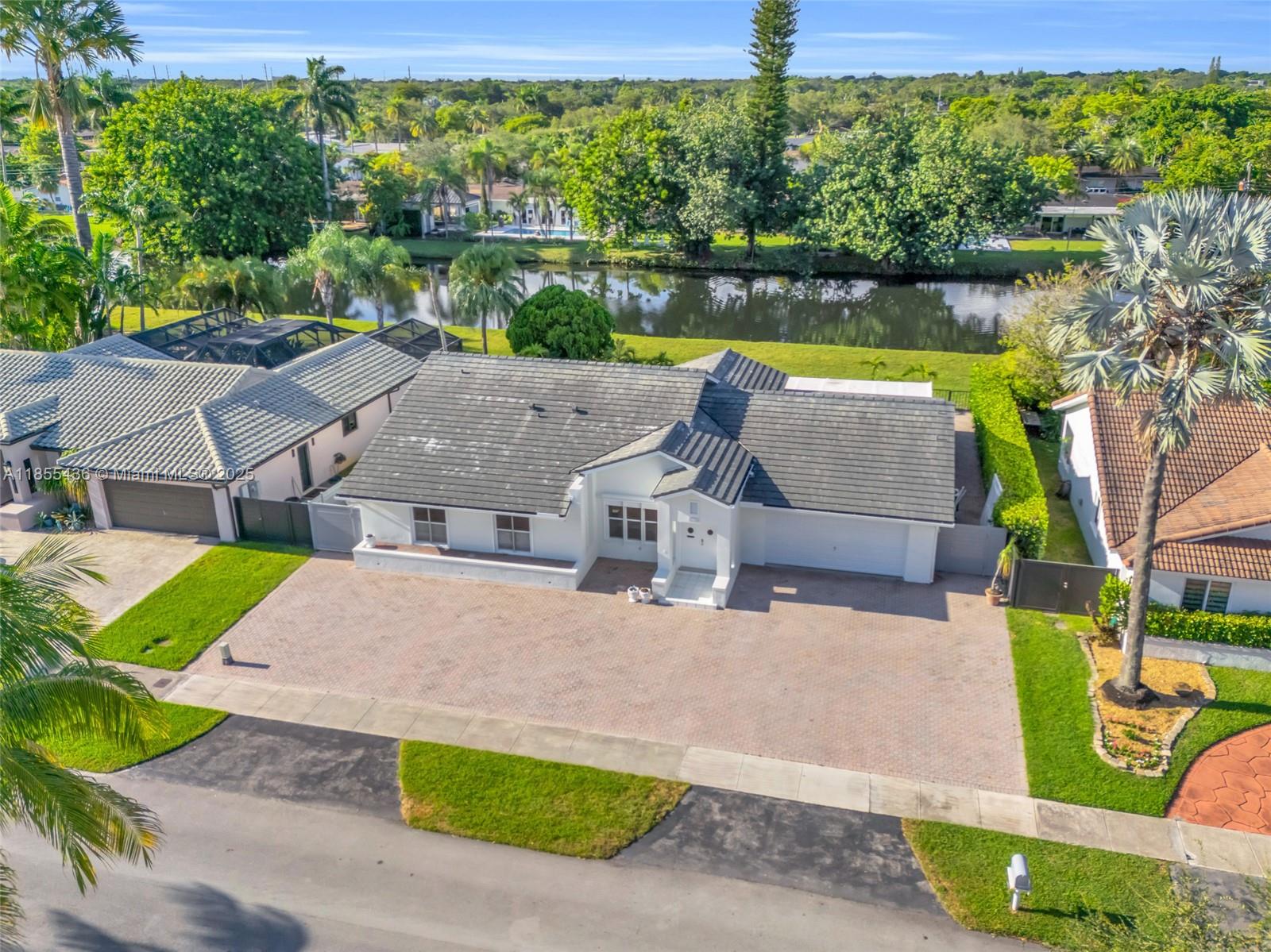 This generously sized Kings Creek home combines space, comfort, and an unbeatable location. Soaring ceilings and an expansive living area create a bright, open feel, while the kitchen and breakfast nook flows seamlessly to a private terrace overlooking the lush greenbelt and canal, giving you peaceful water views and backyard space. Extremely well maintained and full of potential, this home is a true blank slate, ready for a new owner to bring their vision to life. Added perks include a powerful generator for peace of mind. Set in the sought-after Kings Creek community, residents enjoy scenic walking paths, pools, tennis, pickleball & basketball courts, a playground and a clubhouse, all just minutes from shopping, dining, and major highways.