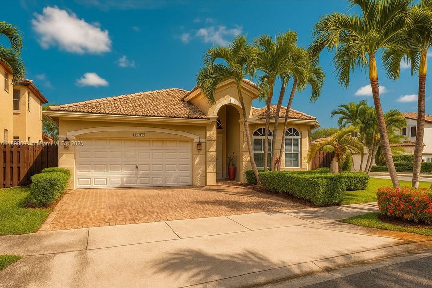 Amazing corner unit single-family home located in the great neighborhood of Islands At Doral, this beautiful home features four bedrooms and three bathrooms, open layout concept, laminated floors stainless steel appliances, fenced backyard for more privacy, 2 Car garage. Brand new Legancy Park offering Club House, Soccer Field, Basketball and Tennis Court. Located near main highways and Turnpike. This home is the complete package.