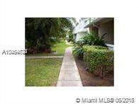 Lovely, cozy town house in the Miami Lakes area. Living room, dining room, and kitchen with wooden floors and ceramic tiles on the second floor. Laundry room with washer and dryer inside unit. It has a sight full balcony facing a great pool view. Storage outside for all those extra things. Community has two pools, a spa, and a gym. Security card gate and guide patrol makes rounds. Rent includes amenities and trash. Quiet community, near high ways and many shopping centers.