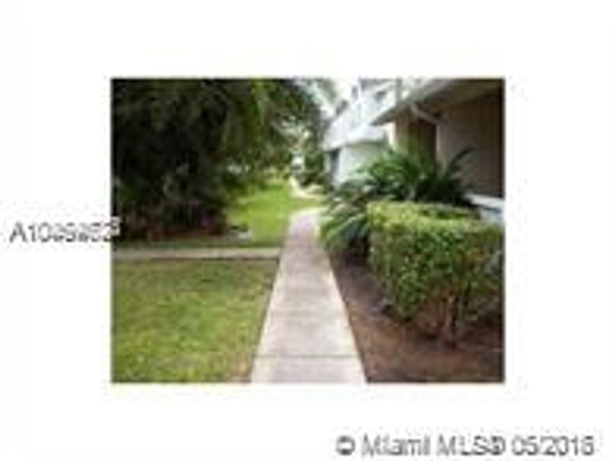 Lovely, cozy town house in the Miami Lakes area. Living room, dining room, and kitchen with wooden floors and ceramic tiles on the second floor. Laundry room with washer and dryer inside unit. It has a sight full balcony facing a great pool view. Storage outside for all those extra things. Community has two pools, a spa, and a gym. Security card gate and guide patrol makes rounds. Rent includes amenities and trash. Quiet community, near high ways and many shopping centers.