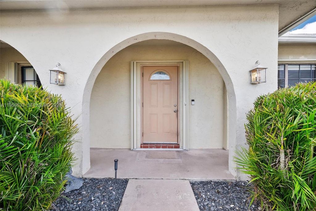 Photo of 10640 NW 20th Ct, Sunrise, FL 33322 (MLS # A11958633)