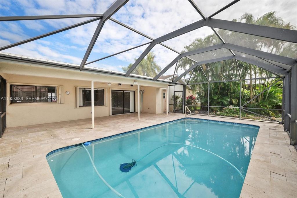 Photo of 10640 NW 20th Ct, Sunrise, FL 33322 (MLS # A11958633)