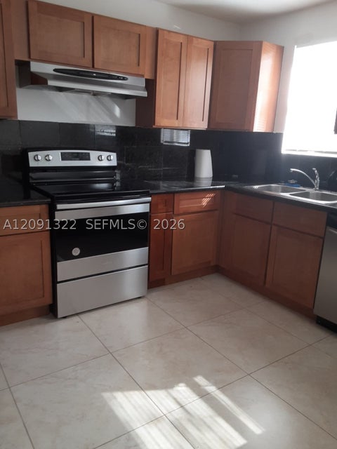 Photo of 2200 Taylor St #101, Hollywood, FL 33020 (MLS # A12091322)