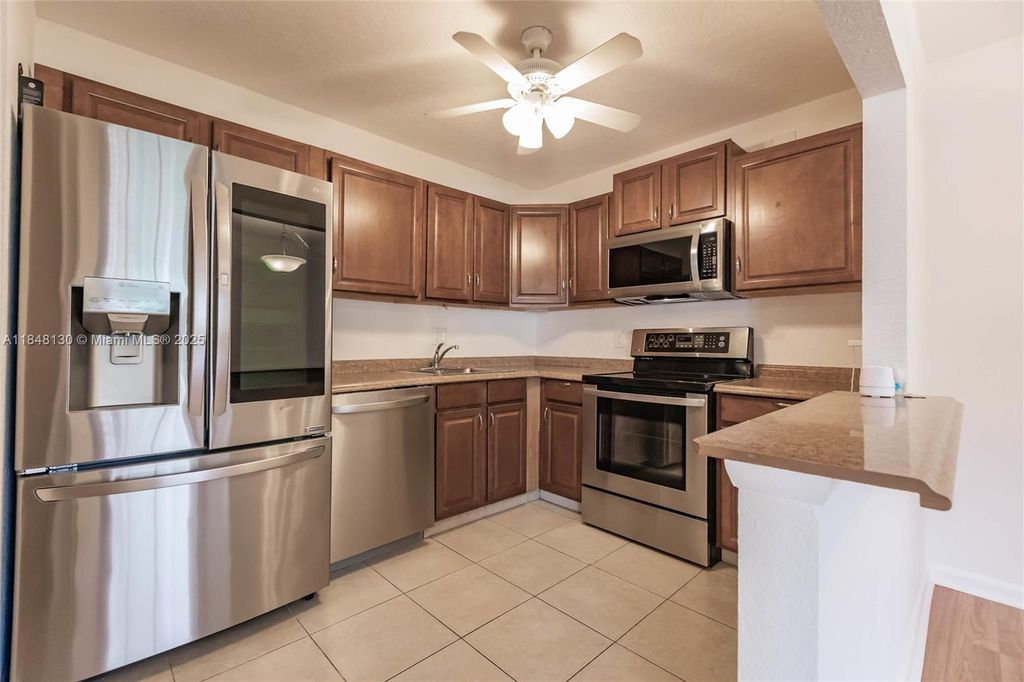 Photo of 3531 Long Pine Ct #A-1, Green Acres, FL 33463 (MLS # A11848130)