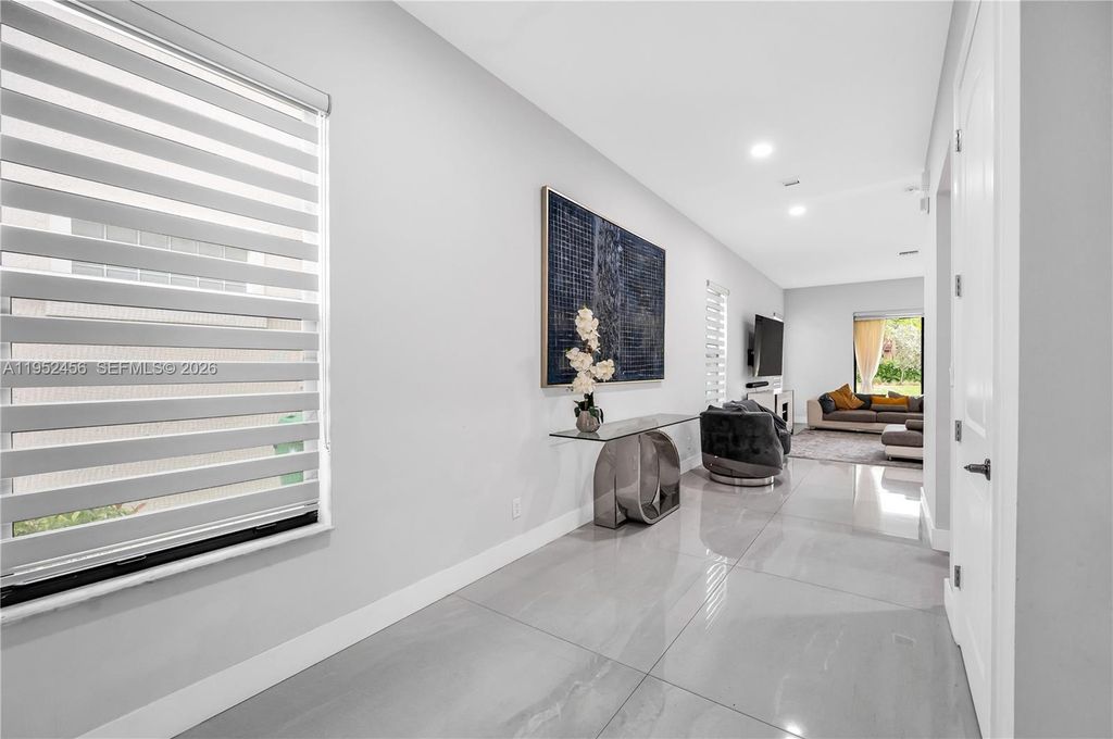 Photo of 8645 NW 39th Ct, Coral Springs, FL 33065 (MLS # A11952456)