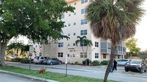 Photo of 1830 Dixieanna St #605, Hollywood, FL 33020 (MLS # A12099251)