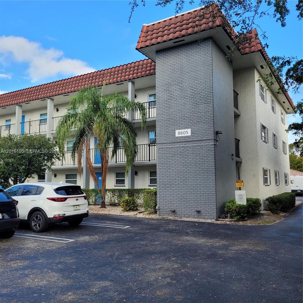 Photo of 8605 W Sample Rd #111, Coral Springs, FL 33065 (MLS # A12016105)