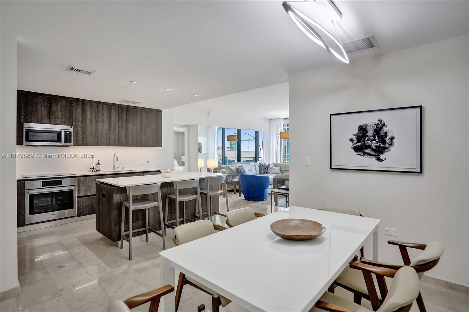 Spectacular 2 Bedrooms / 2.5 Bathrooms furnished residence at the renowned Reach at Brickell City Centre. Enjoy phenomenal city and water views from a spacious balcony with floor-to-ceiling glass. Features include imported Italian marble flooring, sleek Italian kitchen with premium appliances, and a highly functional open layout. Luxury amenities include resort-style pool & jacuzzi, fitness center with sauna/steam, spa, party room, children’s playroom, biometric elevator access, 24-hr concierge & security, plus direct access to Brickell City Centre mall. Vacant & easy to show schedule today!