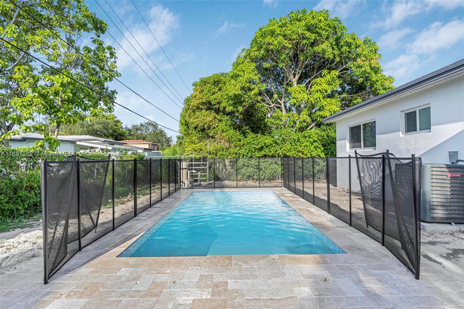 3 Bed / 2 Full Baths + 1/2 bath for the pool area. FULLY RENOVATED home. NEW roof, impact windows, electrical, plumbing, all PVC sewer pipes and AC New kitchen/appliances, bathrooms and screened patio. Large kitchen with plenty of storage space. You would be the first one to use everything!