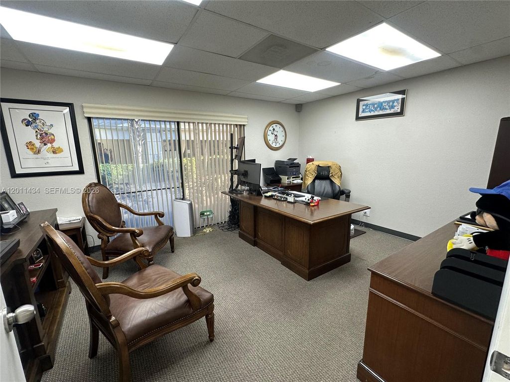 Photo of 3000 N University Dr #2E, Coral Springs, FL 33065 (MLS # A12011434)