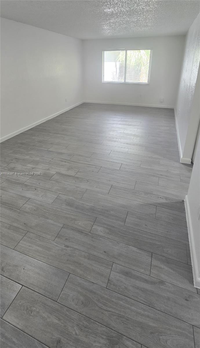 1st Month Free and Fast Approval! Spacious and well-maintained 1-bedroom, 1-bathroom apartment available for rent, just minutes from Turnpike Exits 12 and 13. Enjoy the comfort of central A/C and the security of impact windows throughout. Rent includes water and high-speed Internet/WiFi. The unit comes with 2 unassigned parking permits and is located in a gated community offering great amenities such as a pool, laundry facilities, and more.