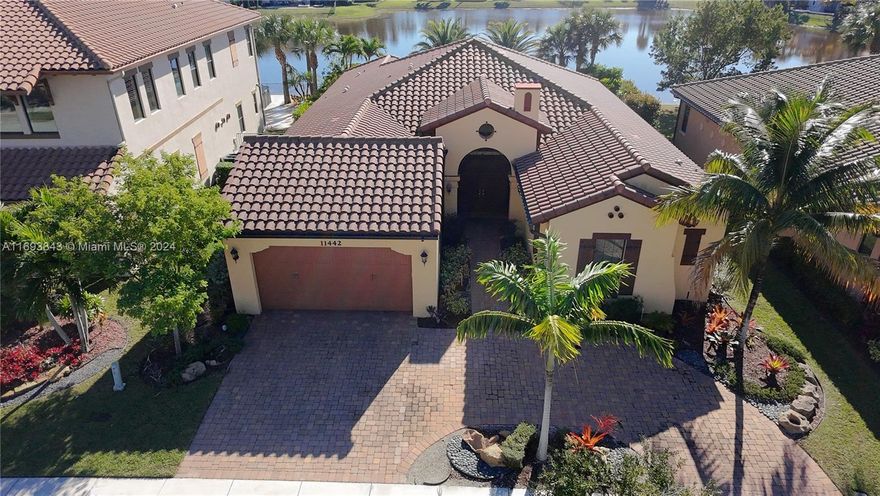 Immaculate one-story waterfront single home, in the prestigious 24-hour guard gated community of Heron Bay, Osprey Lake, at Parkland. Great room, breakfast area, big kitchen, formal dining room, 3 bedrooms + Big DEN, 3.5 bathrooms, closets, a two-car garage, and impact windows. Over $100K in improvements!. Extended circle driveway, beautiful backyard with an elevated deck for hot tub, pergola patio, and fence.  Used only for vacation. Clubhouse with: gym facilities, swimming pools, spa, water features, steam room, sauna, tennis & pickleball courts, racquetball courts, basketball courts, volleyball courts, locker rooms, dressing areas, parking facilities,  Great location, A+Schools, restaurants, services, close to highways and mall. For showing, please use ShowingTime or text listing agent