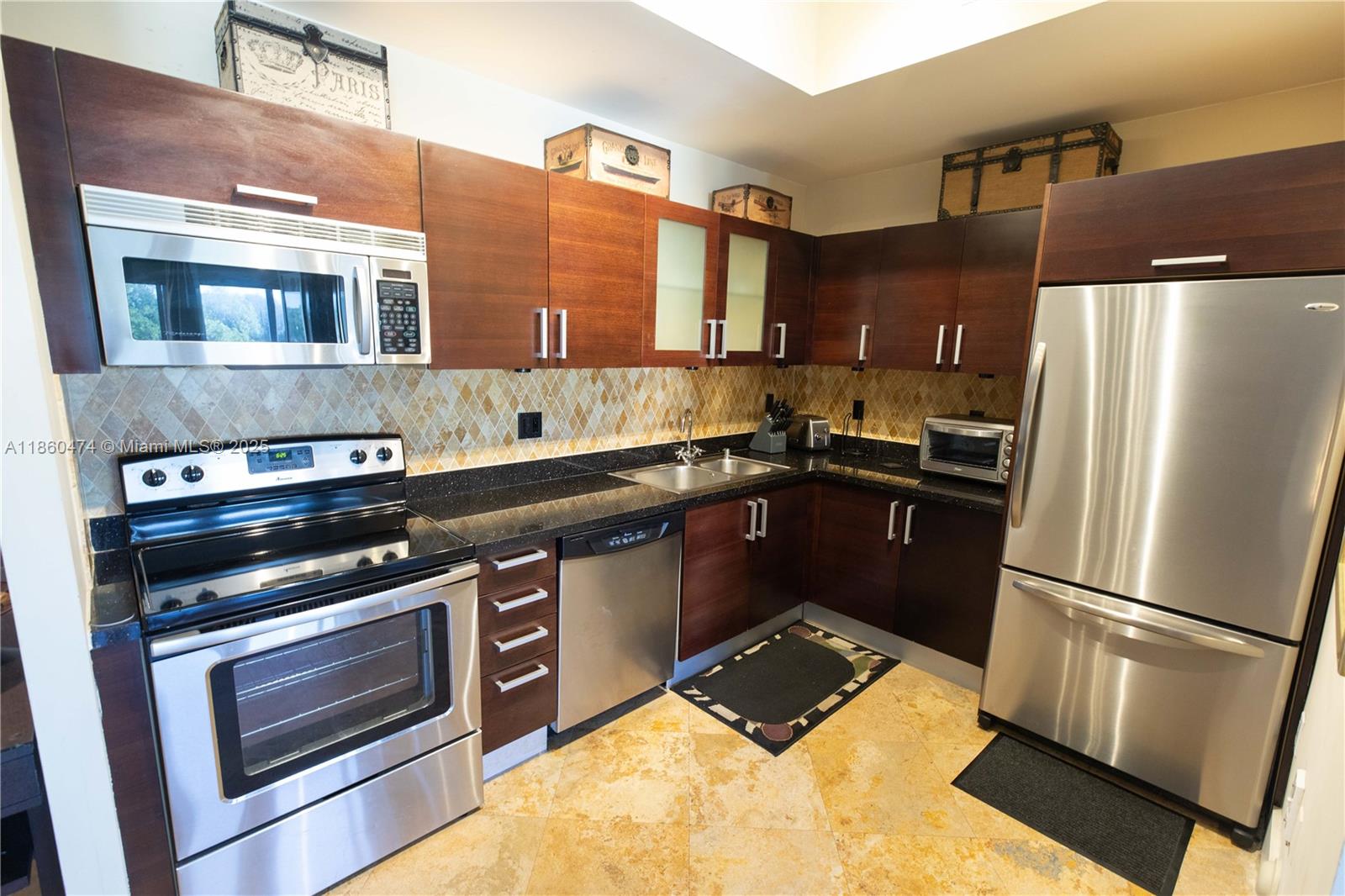 LOFT style furnished unit in the heart of Center Grove. This spacious condo has a modern open kitchen with stainless steel appliances, two full bathrooms, washer and dryer, walk-in closet and full balcony. One assigned parking space in the garage. Beautiful panoramic views of the city from the roof top pool area. Great deal, water, cable, internet included in the rent. Available from six months to one year. Location, location, location amidst shops, restaurants, movies theater, parks and the marinas on Biscayne Bay.