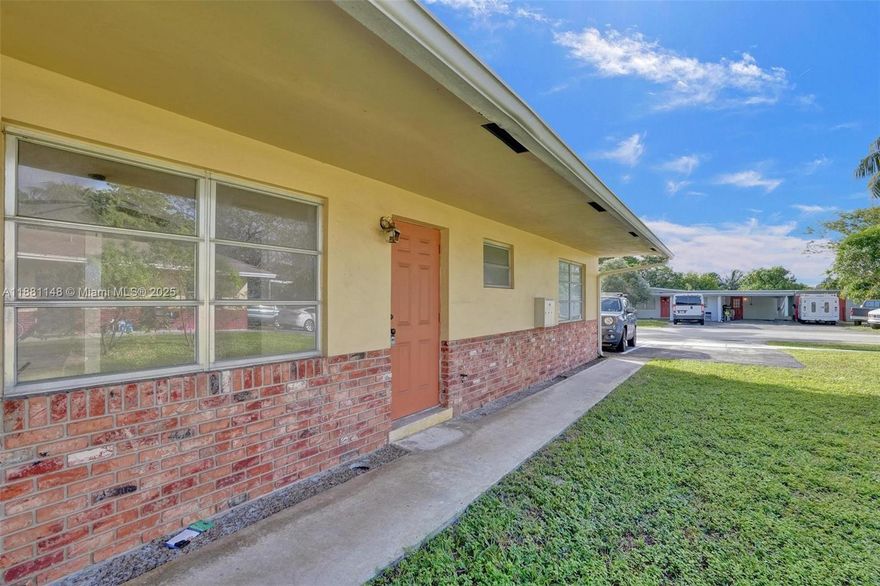 Spacious 2 bedroom, 1 bath duplex located in the heart of Oakland Park! This home offers a bright and open floor plan with tile flooring throughout, a comfortable dining/living area, and a primary bedroom conveniently situated on the ground level. The kitchen comes equipped with an electric range, refrigerator, and sink purifier. Additional features include walk-in closets, blinds/shades, and exterior lighting. Enjoy outdoor space with fruit trees on the lot. Parking includes Assigned spaces plus street parking. Centrally located near shops, dining, schools, and major highways.