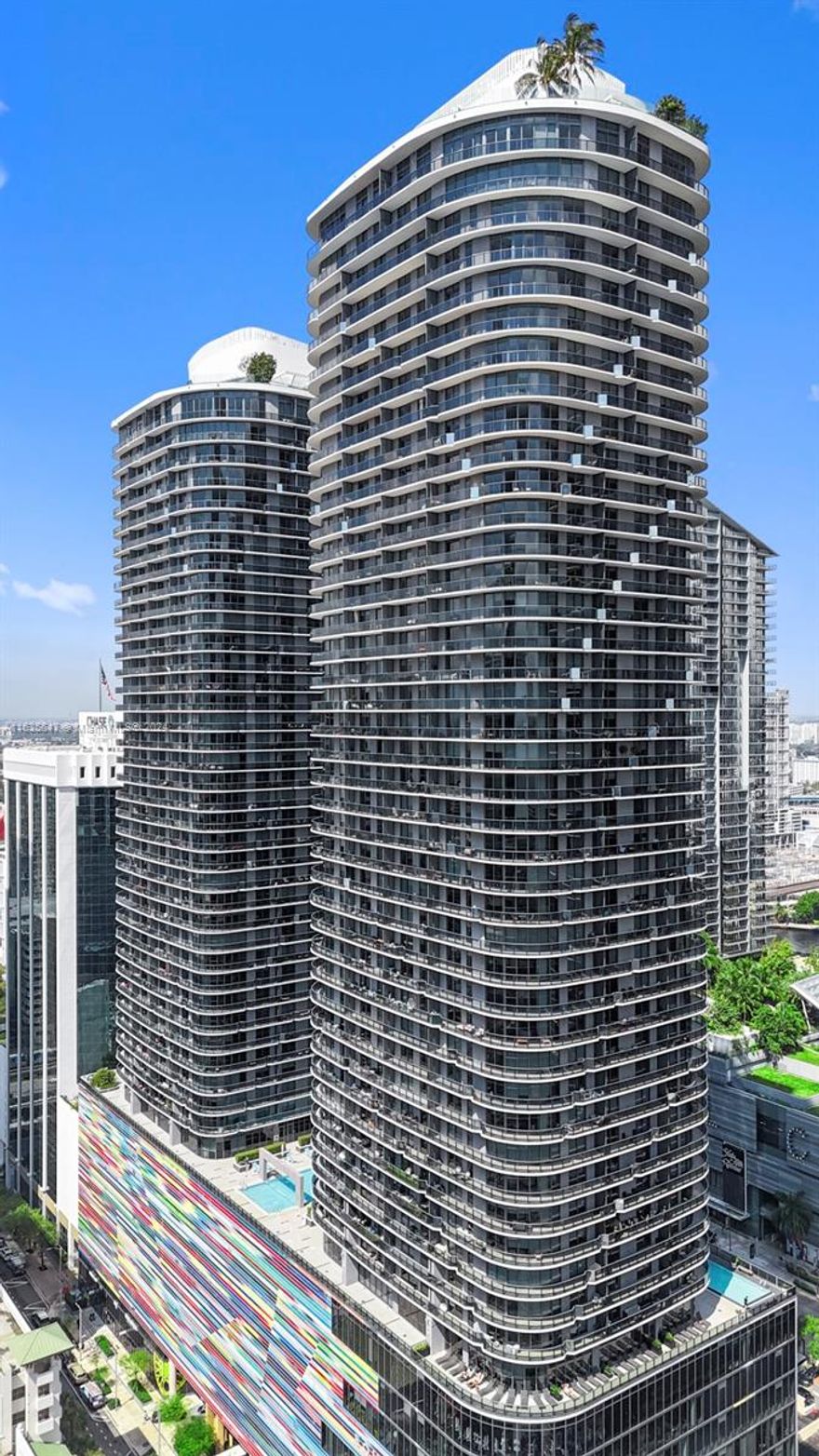 Experience luxury living in this stunning corner 2 bed/2 bath condo on the 35th floor of Brickell Heights East, located in the heart of Miami's vibrant Brickell district. This contemporary residence offers breathtaking city and partial bay views from its expansive wraparound balcony that can be accessed from both bedrooms. The open and split floor plan features floor-to-ceiling windows, allowing natural light to flood the space. It also includes a large entry/foyer area that can be utilized for extra living space (den, office, etc.) The sleek kitchen boasts modern cabinetry and stainless steel appliances. The bldg. offers resort-style amenities, including two pools, a fitness center, spa, and 24-hour concierge. Steps from Brickell City Centre, Publix, restaurants, nightlife and much more!