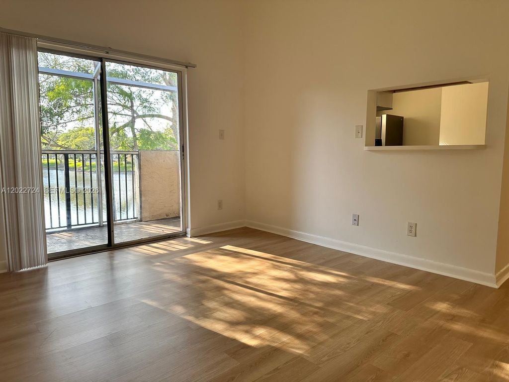 Photo of 631 Cypress Lake Blvd #O17, Deerfield Beach, FL 33064 (MLS # A12022724)