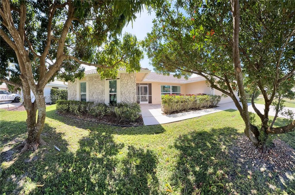 Photo of 10126 Crosswind Rd, Boca Raton, FL 33498 (MLS # A11841964)