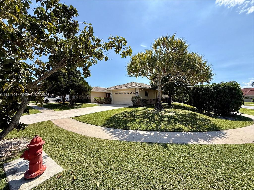 Photo of 10126 Crosswind Rd, Boca Raton, FL 33498 (MLS # A11841964)