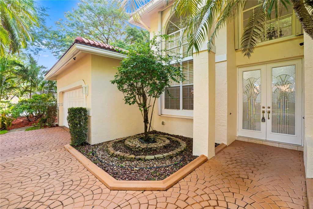 Photo of 6020 NW 61st Mnr, Parkland, FL 33067 (MLS # A11784990)