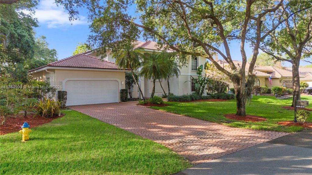 Photo of 6020 NW 61st Mnr, Parkland, FL 33067 (MLS # A11784990)