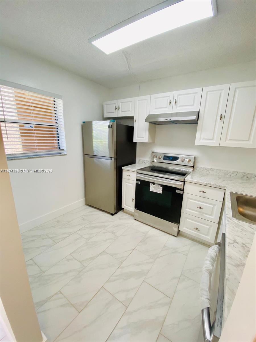 Nicely remodeled 2/2 condo in Bella Grand, Pembroke Pines with screened patio area. This stylish condo features premium finishes throughout, including upgraded flooring, a modern kitchen, and elegantly remodeled bathrooms. The kitchen is equipped with stainless steel appliances, granite countertops, and wood cabinetry. A full-size washer and dryer are conveniently located inside the unit. Relax and unwind on your private screened-in patio terrace. Bella Grand is a meticulously maintained community offering resort-style amenities such as a swimming pool, tennis courts, walking trails, and scenic sidewalks. Don’t miss out on this exceptional rental opportunity in the heart of Pembroke Pines! No pets allowed, per HOA