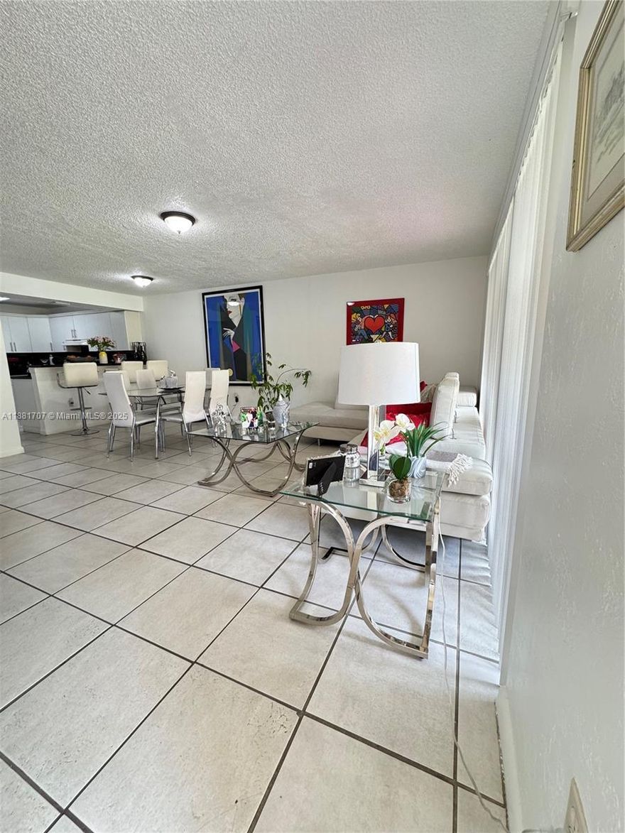 Great opportunity! Spacious 2-bedroom, 2-bathroom condo located in the heart of West Kendall. This bright unit features impact windows (both bedrooms) tile flooring throughout, open living and dining areas, and the convenience of an in-unit washer & dryer. It also includes outside storage, a private balcony, and a private patio at the entrance, perfect for BBQs or simply relaxing outdoors.  Prime Location, enjoy the convenience of being just minutes away from: West Baptist Hospital (less than 2 miles), Multiple shopping centers, pharmacies & restaurants, local library, Excellent magnet schools, easy access to major highways for smooth commuting.  Whether you’re looking for your next home or a solid investment property, this condo offers comfort, location, and value all in one.